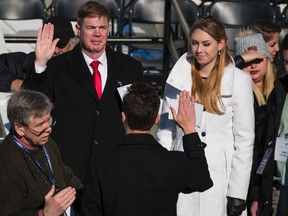 Army Sgt. Maj. Greg Lowery, left, and Army Spc. Sara Corry, stand in for President-elect Donald Trump and Melania Trump during a rehearsal of the swearing-in ceremony at the U.S. Capitol, Sunday, Jan. 15, 2017, in Washington. (AP Photo/J. David Ake)