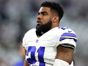 Ezekiel Elliott of the Dallas Cowboys warms up on the field prior to the NFC Divisional Playoff game against the Green Bay Packers at AT&T Stadium on January 15, 2017 in Arlington, Texas. (Tom Pennington/Getty Images)