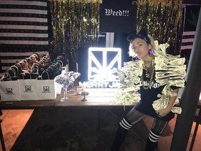 Miley Cyrus poses beside a 'weed bar' set up for guests at a birthday party for her beau, Liam Hemsworth. (Instagram Photo)