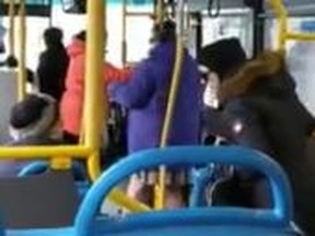A video shows a young woman hurling insults at an older passenger.
(FACEBOOK)