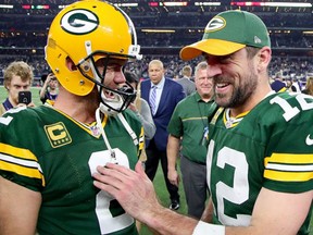 Mason Crosby of the Green Bay Packers celebrates with Aaron Rodgers of the Green Bay Packers after kicking the game winning field goal against the Dallas Cowboys in the final seconds of a NFC Divisional Playoff game at AT&T Stadium on January 15, 2017 in Arlington, Texas. (Tom Pennington/Getty Images)