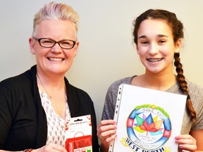 Canada 150 branding subcommittee chair Michele Nicholson (left) presented Jenna Deck with a $20 Tru Country & Garden gift card for winning the Canada 150 logo design contest, which ran back in October. Deck's logo will be the official logo of West Perth's sesquicentennial celebrations this year. GALEN SIMMONS MITCHELL ADVOCATE