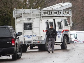 There was a large police presence on Emerson Ave. in London, Ont. on Thursday January 12, 2017. Six people were arrested in connection with two bank robberies on Wednesday night. (DEREK RUTTAN, The London Free Press)