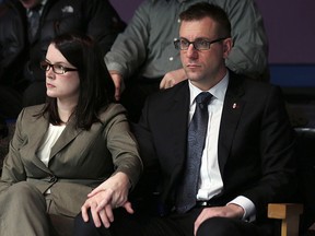 Const. Joe Smyth of the Royal Newfoundland Constabulary and his wife Lisa Smyth look on during the Commission of Inquiry into the death of Don Dunphy in St. John's on Monday, Jan. 16, 2017. THE CANADIAN PRESS/Paul Daly