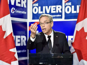 Former ederal finance minister and Conservative candidate Joe Oliver speaks during a press conference in Toronto on Wednesday, September 30, 2015. (NATHAN DENETTE / THE CANADIAN PRESS)