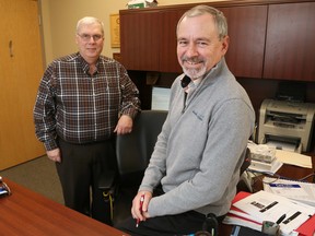 Luke Hendry/The Intelligencer
Hastings County's Jim Duffin, left, and Jim Pine stand in Pine's office Monday in Belleville. Chief administrative officer Pine is now on a part-time contract; Duffin, who since 2006 has been on contract as deputy clerk, now moves up to clerk.