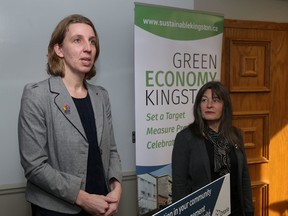 Sustainable Kingston executive director Ruth Noorderaaf and Kingston and the Islands MPP Sophie Kiwala handed out recognition certificates Monday at the Sustainable Kingston office. (Ian MacAlpine/The Whig-Standard)