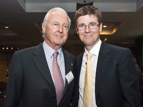 Loblaw Companies Limited Executive Chairman Galen Weston Jr., right, poses with and his father Galen Weston Sr., at the company's annual general meeting in Toronto on Wednesday, May 5, 2010. Oxfam and other charities determined Canada’s two richest men — David Thomson (worth $23.8 billion, according to Forbes) and Galen Weston Sr. ($9.3 billion) — have the same wealth between them as the poorest 30% of their countrymen combined. (THE CANADIAN PRESS)