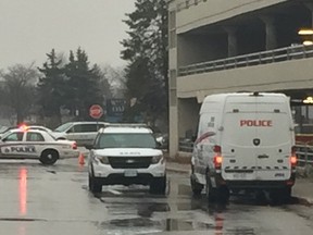 Police remain at a White Oaks Mall parking garage after a man was found there early Tuesday with head injuries. Norman DeBono/The London Free Press/Postmedia Network