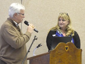 Rick Nicholls, left, introduces Tracy Callaghan at a community event hosted at the Active Lifestyle Centre last Thursday. Callaghan is the executive director of Adult Language and Learning, one of five support services brought to the event by Nicholls.