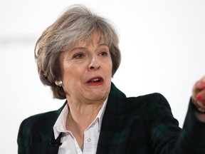 Britain's Prime Minister Theresa May gestures as she delivers a speech on leaving the European Union at Lancaster House in London, Tuesday, Jan. 17, 2017. (AP Photo/Kirsty Wigglesworth, pool)