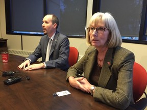 Mayor Bryan Paterson and economic development corporation chairwoman Judith Pineault answer questions about their recent trade trip to China. (Paul Schliesmann/The Whig-Standard)