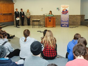 Sophie Kiwala, MPP for Kingston and the Islands, announces the Ontario government's restructuring of the student assistance funding program before students and staff at Bayridge Secondary School in Kingston on Tuesday. Now students from families that earn less than $50,000 will receive free tuition to college or university. As well as graduates will leave with less Ontario debt. (Julia McKay/The Whig-Standard)