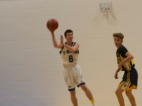 A Ross Sheppard Thunderbirds player takes a routine shot during a recent game. For the next few weeks, such shots will be part of practice for all Metro Edmonton athletes who will be in the gym or on the ice for a few hours day and one or two days a week while the real job of high school – examination – fills the bulk of their schedule. (Supplied)