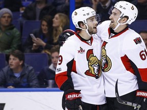 Ottawa Senators' Mark Stone, right, celebrates with Derick Brassard after scoring a goal during the third period of an NHL hockey game against the St. Louis Blues, Tuesday, Jan. 17, 2017, in St. Louis. The Senators won 6-4. (AP Photo/Billy Hurst)