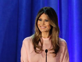 In this Nov. 3, 2016 file photo, Melania Trump, wife of then-Republican presidential candidate Donald Trump, speaks in Berwyn, Pa. People across the globe are always fascinated by what the incoming U.S. first lady is wearing to the inauguration. This time, as never before, the question is interlaced with politics, as designers have publicly grappled with the question of whether they would dress Melania Trump. (AP Photo/Patrick Semansky, File)
