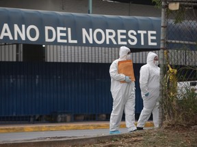 Forensic personnel arrives at a high school where a student opened fire on his classmates in Monterrey, Mexico, on January 18, 2017. (JULIO CESAR AGUILAR/AFP/Getty Images)