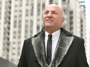 Kevin O'Leary walks along John St. in Toronto on Wednesday January 18, 2017 after formally announcing he is running for the leadership of the federal Conservative Party. (Veronica Henri/Toronto Sun)