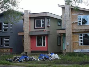 Several narrow homes under construction along 102 Avenue. ED KAISER / POSTMEDIA