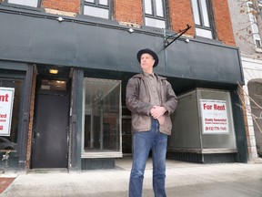 Jason Miller/The Intelligencer. 
Zubin Gillespie stands outside his two vacant downtown storefronts. He's actively searching for tenants but says there hasn't been too many people looking to lease.