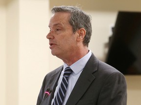 Lawyer Wayne Fairbrother speaks to Frontenac County council in Glenburnie on Wednesday. Fairbrother said allegations of breach of confidentiality by two county councillors are without merit. (Elliot Ferguson/The Whig-Standard)