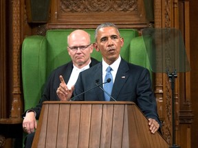 U.S. President Barack Obama addresses Parliament in the House of Commons on Parliament Hill, as House Speaker Geoff Regan looks on, in Ottawa on Wednesday, June 29, 2016. THE CANADIAN PRESS/Justin Tang