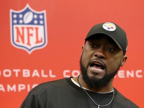 Steelers head coach Mike Tomlin talks with reporters after their practice in Pittsburgh on Wednesday, Jan. 18, 2017. The Steelers face the Patriots in the AFC conference championship on Sunday. (Keith Srakocic/AP Photo)