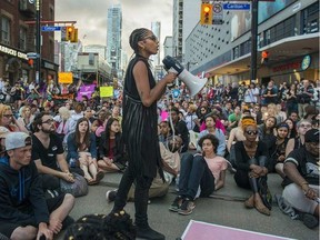 Black Lives Matter activist Janaya Khan organizes a sit-in during the Trans Pride March in Toronto on July 1, 2016.