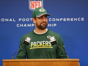 Packers quarterback Aaron Rodgers could be without receivers Jordy Nelson and Davante Adams when they play the Falcons in the NFC Championship game on Sunday in Atlanta. (Matt Ludtke/AP Photo)