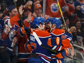 Connor McDavid and Zack Kassian celebrate Kassian's first-period goal against the Panthers Wednesday at Rogers Place. (Ian Kucerak)