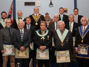 Norwich Masons, from St. John's Lodge No. 104, recently gathered for their last meeting at the historic building on the corner of Stover and Main streets. Thanks to fire code issues, the group is looking to rent space nearby or amalgamate with another lodge. (Submitted)