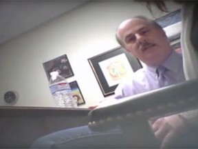 Michael Fine, 59, caught on tape with a client.