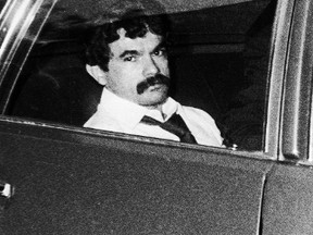 In this July 25, 1981 file photo, Puerto Rican nationalist Oscar Lopez Rivera is driven to jail after his trial where he was convicted of seditious conspiracy in Chicago. After 35 years in prison, President Barack Obama announced on Tuesday, Jan. 17, 2017 he had commuted the sentence of the now 74-year-old who belonged to the ultranationalist Armed Forces of National Liberation, which claimed responsibility for more than 100 bombings at public and commercial buildings during the 1970s and '80s in New York, Chicago, Washington and other U.S. cities. (Chicago Tribune via AP, File)
