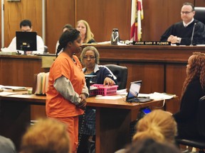 Gloria Williams, the suspect in the kidnapping of a newborn 18 years ago from a Jacksonville, Fla., hospital leaves the courtroom Wednesday, Jan. 18. 2017, in Jacksonville. Her arrest came after DNA tests helped authorities identify the woman who had been living with Williams in Walterboro, S.C., as Kamiyah Mobley. (Bob Self/The Florida Times-Union via AP)