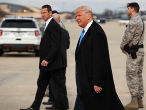 President-elect Donald Trump arrives at Andrews Air Force Base, Md.,Thursday, Jan. 19, 2017, ahead of Friday's inauguration. (AP Photo/Evan Vucci)