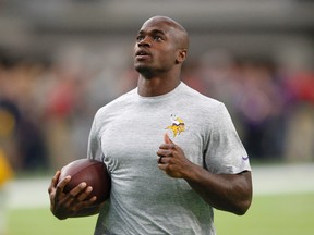 Vikings running back Adrian Peterson seems to have no trouble envisioning himself in a different uniform next season. (Andy Clayton-King/AP Photo/Files)