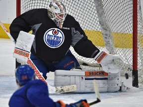 Oilers Jujhar Khaira (54) fires the puck on goalie Laurent Brossoit during practice at Rogers Place in Edmonton, Tuesday, January 17, 2017.