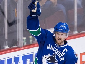 Vancouver Canucks' Henrik Sedin, of Sweden, celebrates his goal against the Nashville Predators during the third period of an NHL hockey game in Vancouver, B.C., on Tuesday January 17, 2017. (THE CANADIAN PRESS/Darryl Dyck)