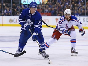Jake Gardiner of the Toronto Maple Leafs gets away from Kevin Hayes of the New York Rangers during NHL action at the Air Canada Centre in Toronto on Jan. 19, 2017. (DAVE ABEL/Toronto Sun)