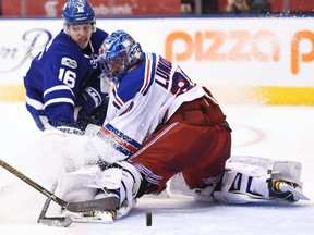 Toronto Maple Leafs centre Mitchell Marner is stopped by New York Rangers goalie Henrik Lundqvist during second period NHL action in Toronto, Thursday, January 19, 2017. (THE CANADIAN PRESS/Frank Gunn)