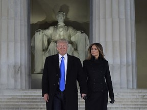 US President-elect Donald Trump and his wife Melania arrive to attend an inauguration concert at the Lincoln Memorial in Washington, DC, on Jan. 19, 2017. (GETTY IMAGES/PHOTO)
