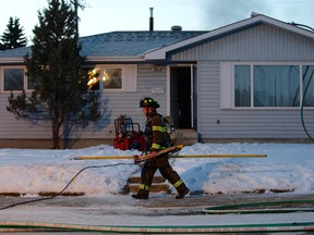 Edmonton firefighters responded immediately to a home located near 71 street and 89 Ave. where the fire had spread from the garage to the house. David Bloom/Postmedia