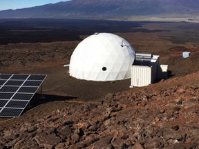 In this photo provided by the University of Hawaii, six carefully selected scientists entered this geodesic dome called Hawaii Space Exploration Analog and Simulation, or HI-SEAS located 8,200 feet above sea level on Mauna Loa on the island of Hawaii, Thursday, Jan. 19, 2017. The four men and two women moved into their new simulated space home Thursday afternoon, as part of a human-behaviour study that could help NASA as it draws up plans for sending astronauts on long missions to Mars. (University of Hawaii via AP)