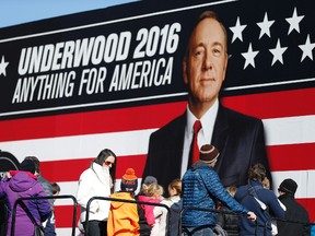 In this Feb. 13, 2016 file photo, people stand in line waiting to enter the Underwood 2016 booth ahead of the CBS News Republican presidential debate in Greenville, S.C. Netflix announced on Jan. 20, 2017, that political drama “House of Cards” will return this May for a fifth season. (AP Photo/John Bazemore, File)
