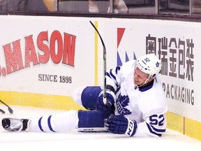 Martin Marincin #52 of the Toronto Maple Leafs crashes into the boards during the first period against the Boston Bruins at TD Garden on December 10, 2016 in Boston, Massachusetts. (Photo by Maddie Meyer/Getty Images)