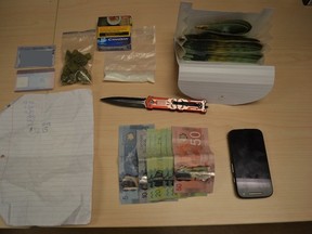 Drugs, cash and other items seized by the Kingston Police drug unit during a vehicle take down in a Montreal Street parking lot on Thursday, January 19, 2017. Photo supplied by Kingston Police