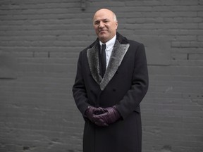 Newly announced Federal Conservative leadership candidate Kevin O'Leary pauses for a photograph as he leaves a television studio following an interview in Toronto on Wednesday January 18, 2017. (THE CANADIAN PRESS/Chris Young)