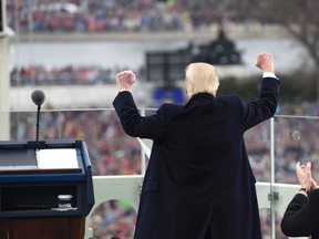 U.S. President Donald Trump celebrates after his speech during the presidential inauguration on Capitol Hill in Washington, Friday, Jan. 20, 2017. (Saul Loeb/Pool Photo via AP)