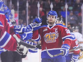 Aaron Irving of the Edmonton Oil Kings celebrates with the bench after scoring against the Calgary Hitmen at Scotiabank Saddledome on Dec. 30, 2016 in Calgary. (Getty Images)