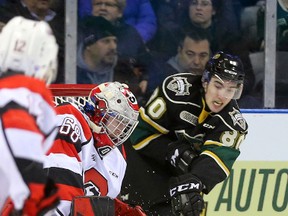 London Knights forward Alex Formenton of the Knights tries a wraparound on Ottawa 67?s goalie Oliver Lafreniere during their OHL game at Budweiser Gardens on Friday night. (MIKE HENSEN, The London Free Press)